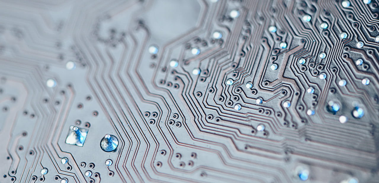 Close-up of a computer circuit board representing the technology and infrastructure behind artificial intelligence, a growing focus of policy and regulatory discussions in Washington.