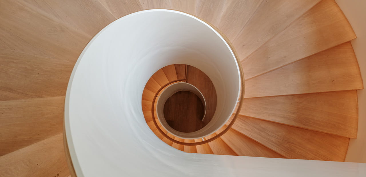 Spiral staircase viewed from above, symbolizing rising Treasury yields