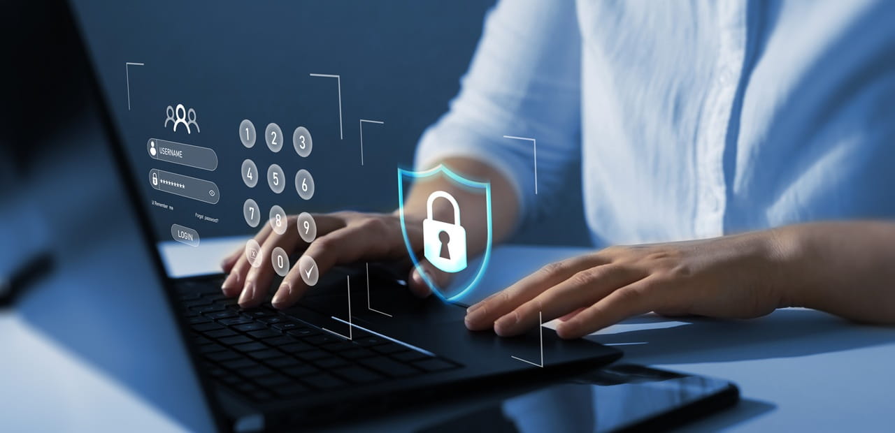 Laptop user practicing cybersecurity best practices to protect personal information online.