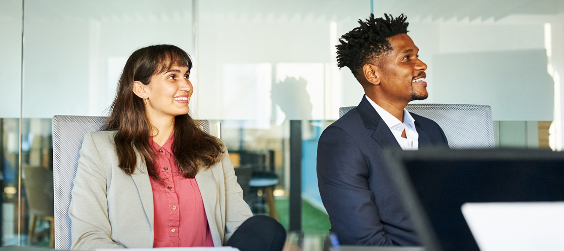 Multiracial business colleagues in a boardroom meeting