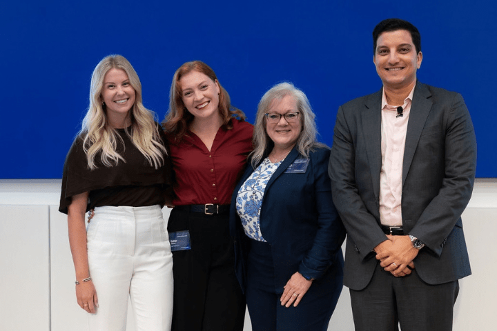 Award of Excellence 3 Winners Alyssa, Esther and Tayna and Paul Shoukry standing together at the second quarter townhall 